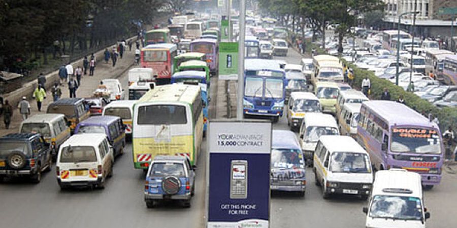 A busy street with cars and people in Nairobi