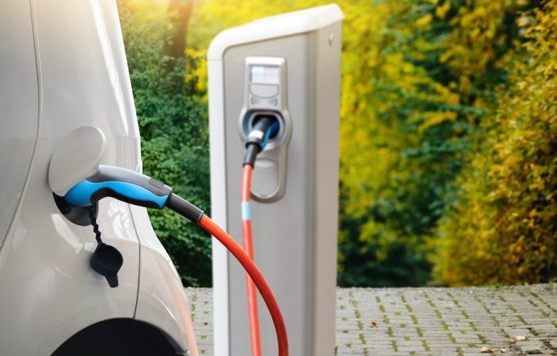 A white eletric car charging