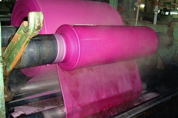 A textile machinery with pink fabric in Pakistan