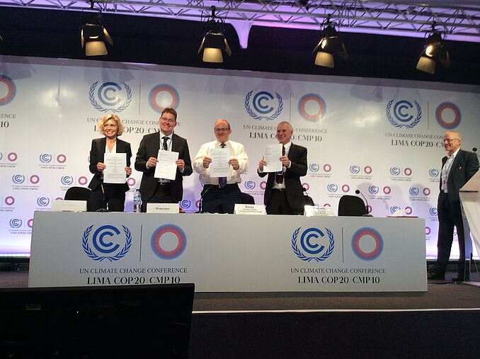 Panel at COP20 standing